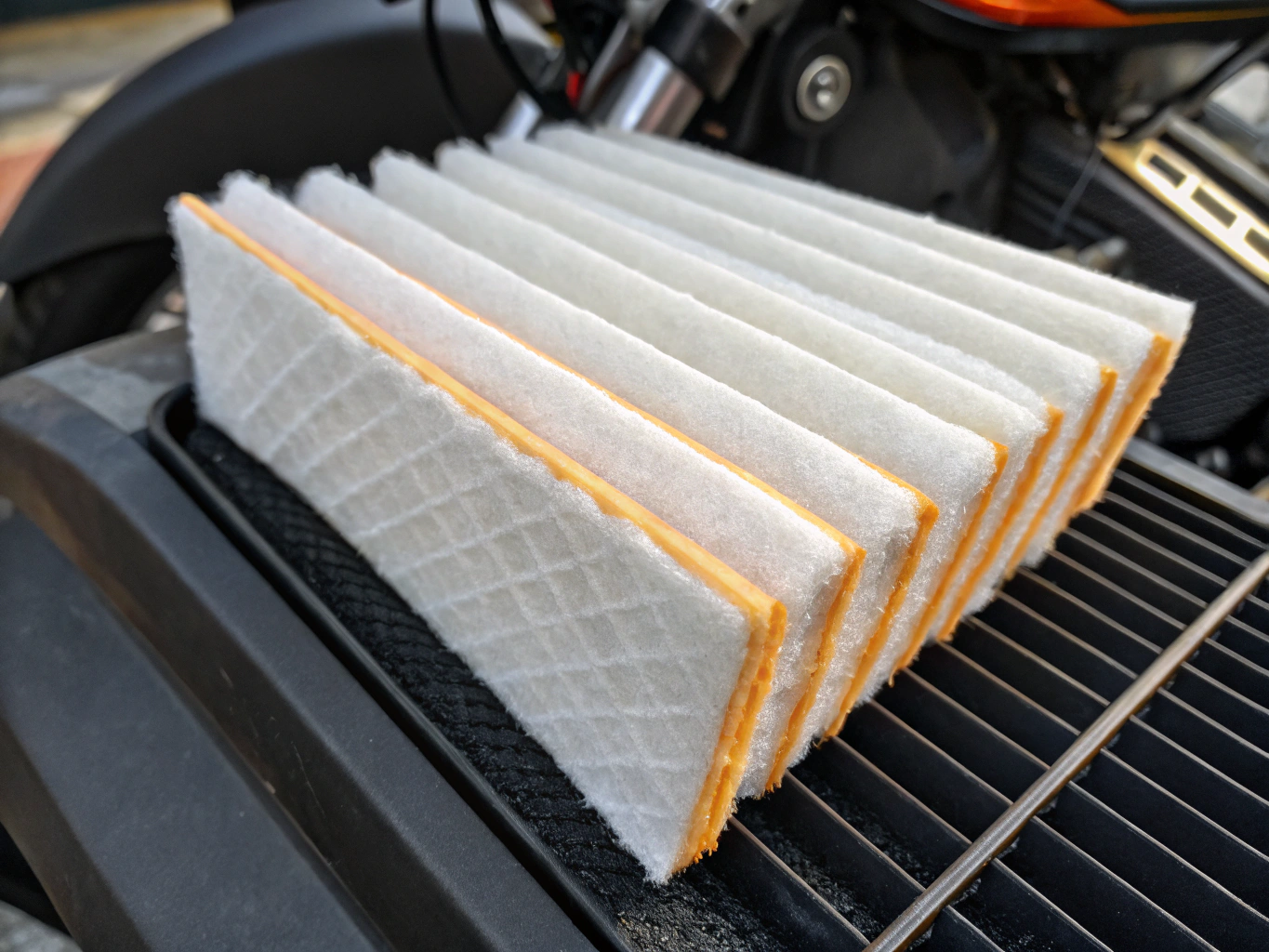 Multilayer rimmed and spot-welded wire mesh filter packs