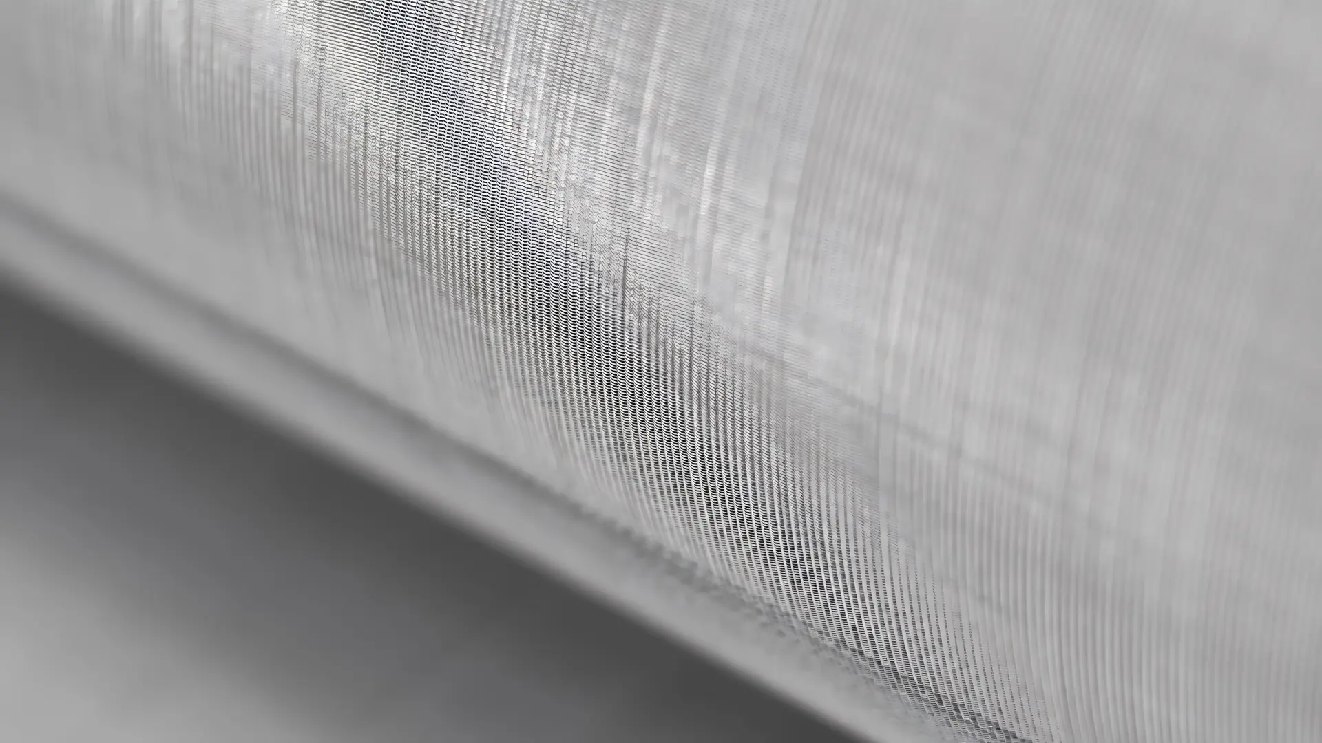 Macro close-up of precision stainless steel woven and sintered filtration wire mesh