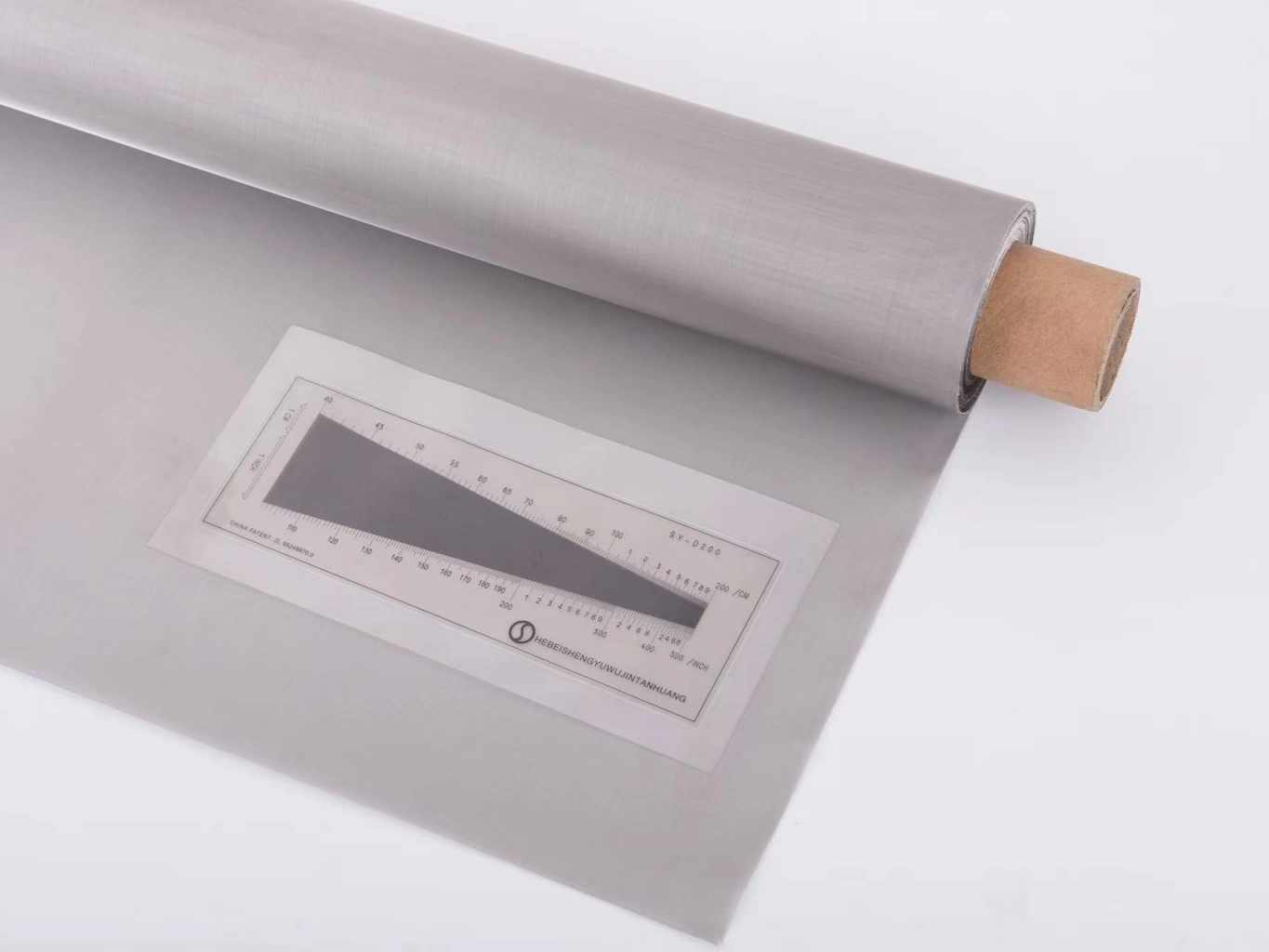 Precision woven stainless steel wire mesh closeup with square apertures